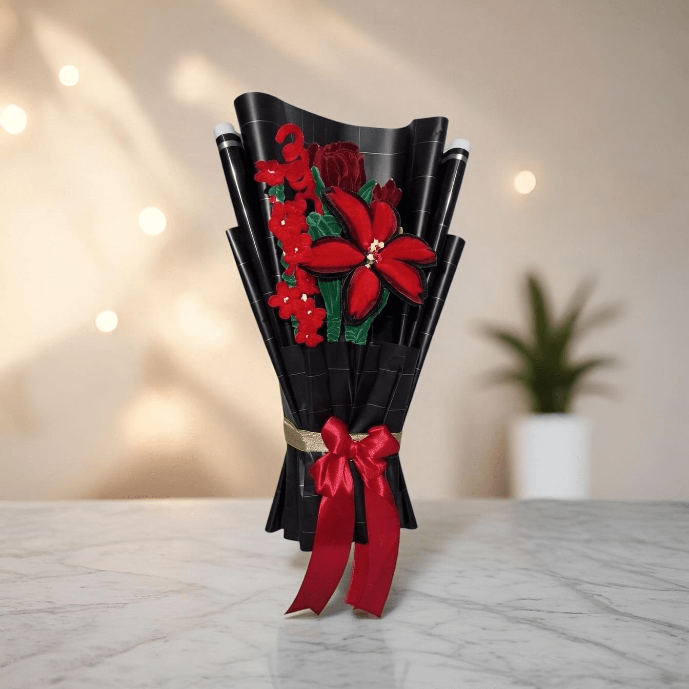 Crimson Noir Bouquet – Deep red roses wrapped in elegant black and gold paper.